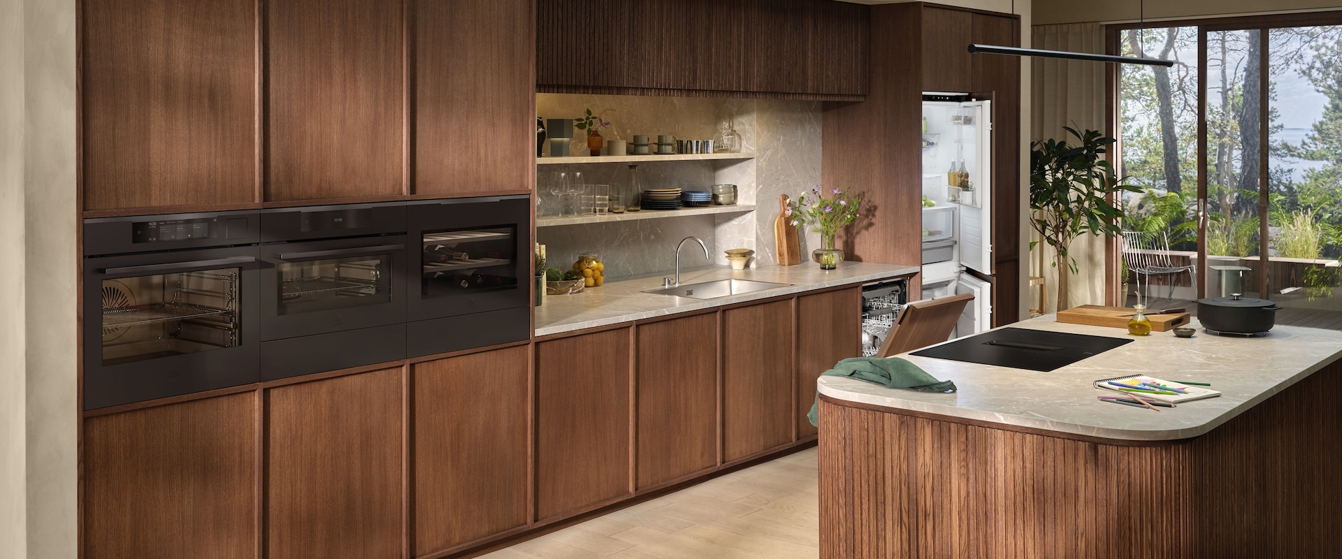 A modern wooden kitchen with appliances from Electrolux.